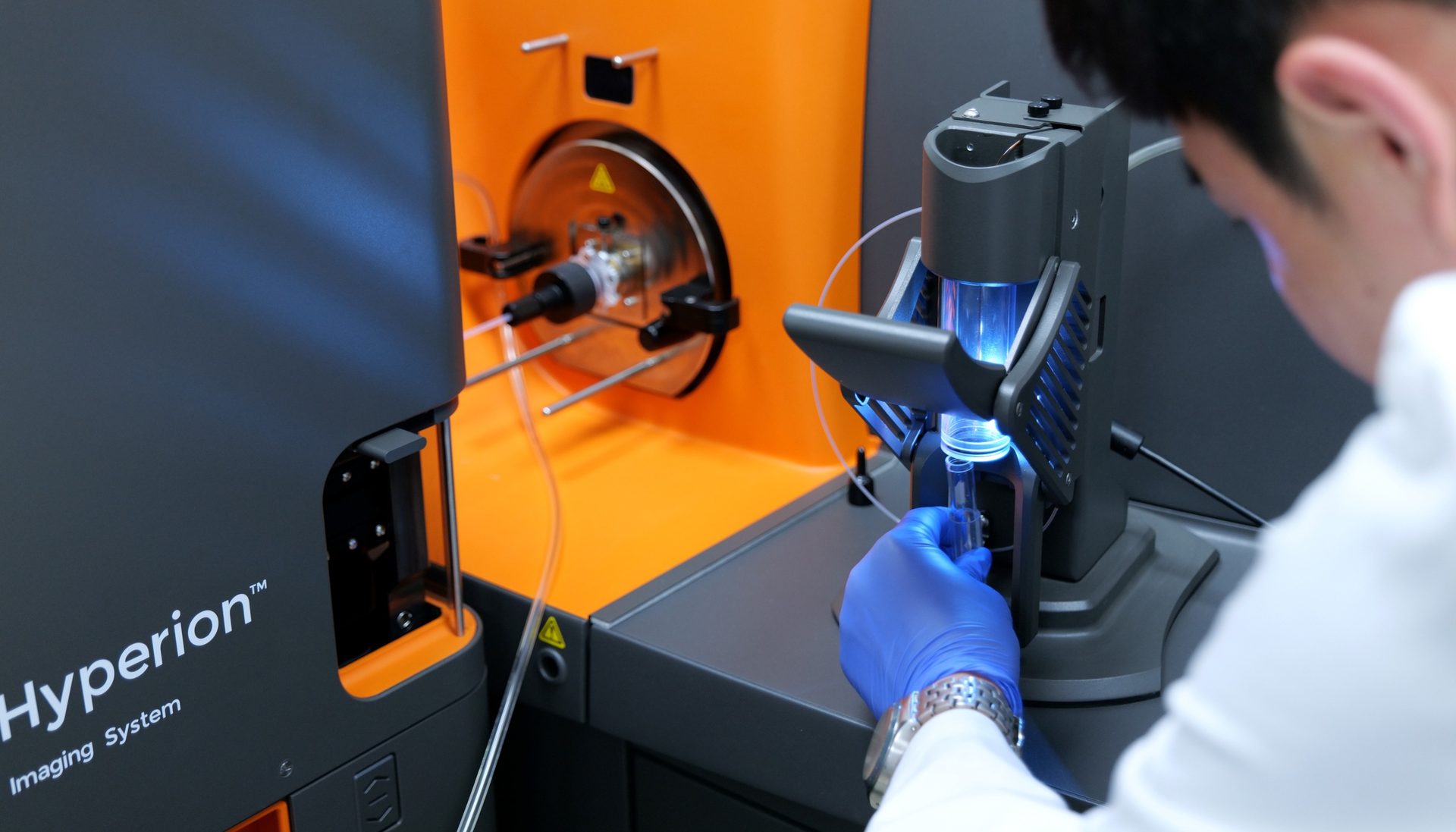 Immunology Laboratory - a researcher analyzing samples with the Hyperion imaging system